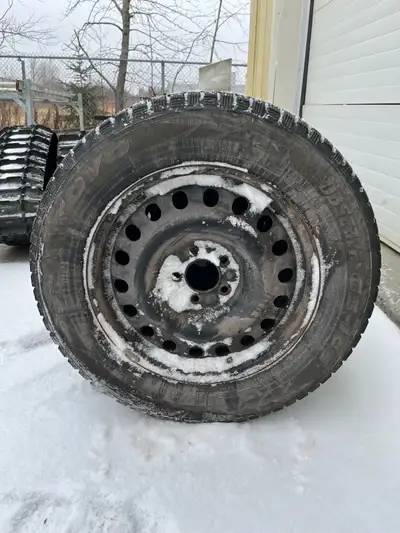 Set of 4 Toyo G3-ice winter tires and metal rims. Was on a 2024 Chevy Equinox. Saw only one winter,...