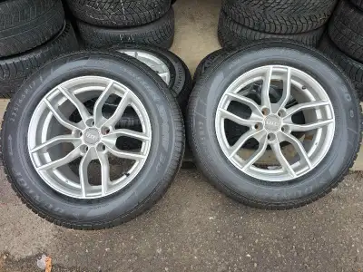 Set of 4 17 inches Audi Q5 rims with Dunlop winter tires on them 235/65/R17. Rims and tires are in g...