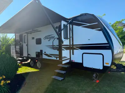 This 2019 Grand Design Imagine 2500RL is a high-quality, well-maintained travel trailer perfect for...