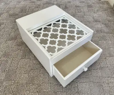White and glass decorative jewelry box with slight imperfections shown in photos but otherwise in ex...