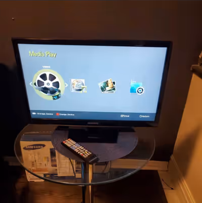Samsung Flat Screen LED 24" Monitor/ TV With Stand, Power Cord And Remote. Condition Is Used Like Ne...