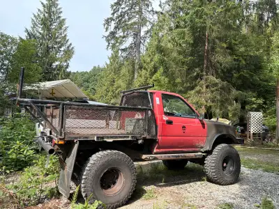 1988 Toyota with 12 foot aluminum boat and motor with new seats and ors ( optional) 4.88 gears 16 in...