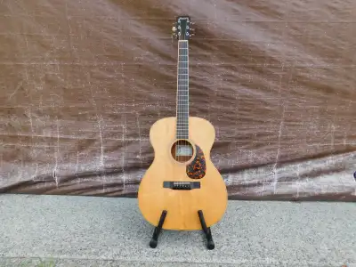 Larrivee OM-03 acoustic guitar. Has some fret wear hence the lowered price. Guitar plays very well a...