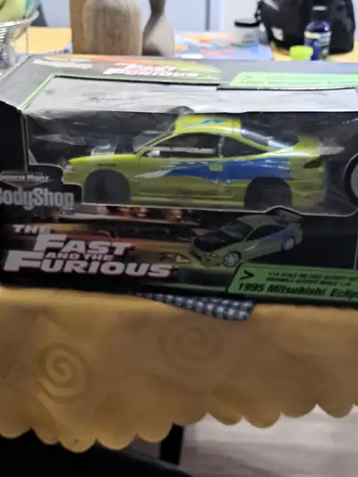 Diecast 1973 mustang and 1993 Mitsubishi  eclipse  still in boxs, View more