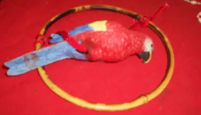 CERAMIC HANGING PARROT, BRAND NEW 6 inches long, brought from Regal over 30 years ago. I bought it f...