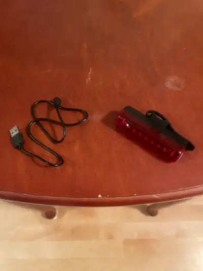 This tail light works well. It has different light modes on it with cool effects. Long battery life....