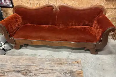 Victorian-style antique sofa, likely from the mid-to-late 1800s or an early 1900s reproduction•Carve...