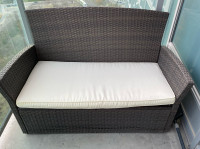 Outdoor patio set with 4 beige cushions