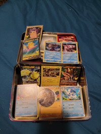 Pokemon tin with over 20 rare card