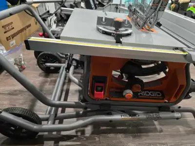 Ridgid table saw and stand., View more