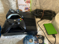 Xbox 360 console with over 100 downloaded games