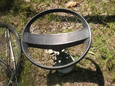 Steering wheel and cables, Propeller, Battery Box - from a 75 Mercury outboard motor