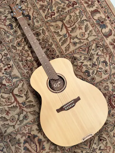 Selling my Riversong Magagna G2 acoustic guitar. Built at the Riversong Canadian custom shop with Ca...