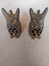 Rare vintage cast iron owl candle holders pair.