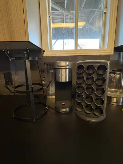 Sleek Keurig K-Supreme single-serve coffee maker in excellent condition. Features a circular brew di...