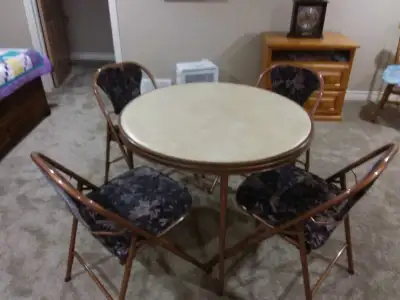 card table and 4 chairs., View more