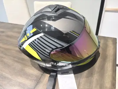XL Auboa motorcycle helmet with tags still on it. Comes with a clear and tinted visor and carrying c...