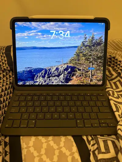 iPad Pro (11-inch) with Apple Pencil* and Logitech Smartfolio Keyboard. Works perfectly, battery lif...