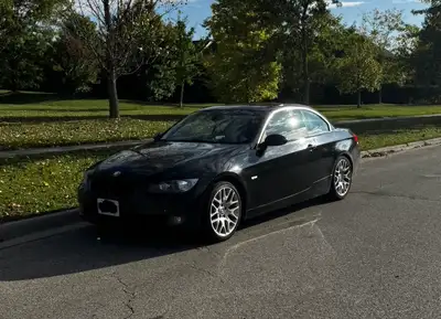 Thinking about selling my BMW. 2009 328i RWD Convertible 151,000km Auto Black exterior on brown leat...