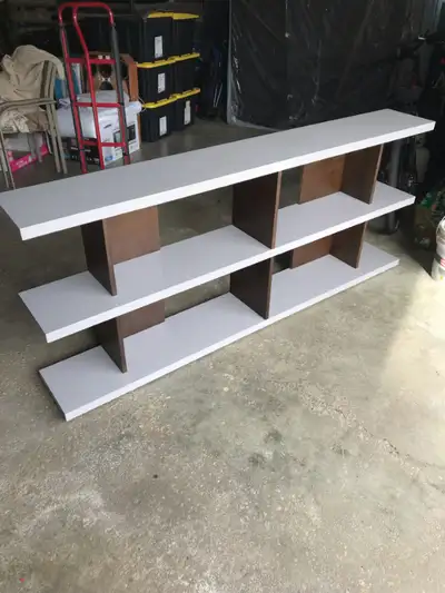 Three tier display shelving unit grey in color, great feature for the house. Very good condition. 35...