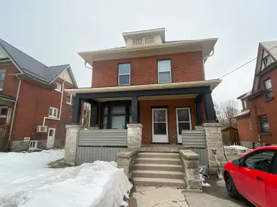 Main floor unit of a charming duplex. Large windows, stained glass and lots of character in this com...
