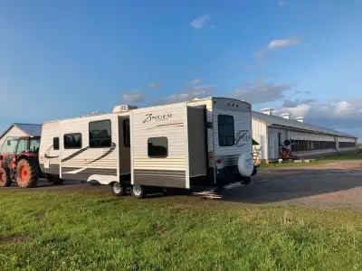 Selling for a friend - 2014 Zinger- 38 feet - has propane hot water and stove - great for off the gr...