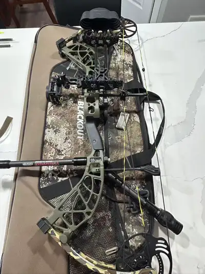 Bear Adapt 2 Left-Hand Compound Bow in excellent condition. Specifications: * Left Hand (LH) * 27” D...