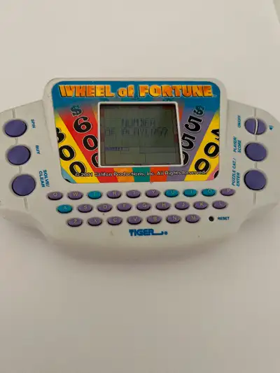 2001 Wheel of Fortune Tiger electronic handheld game, View more