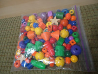 Lot of large wooden and plastic beads kids lacing loose parts