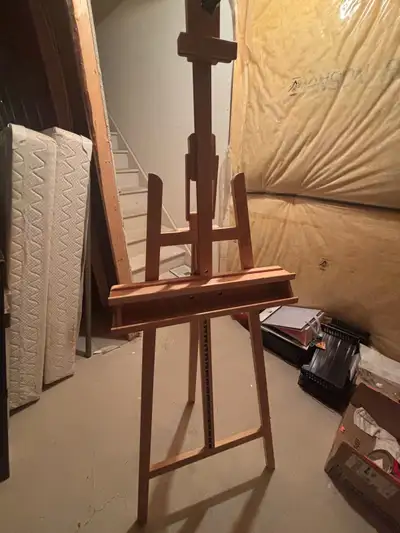 New All wood Completely adjustable Holds large canvases Sturdy Folds for storage