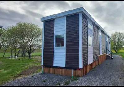 Looking for quiet and personal space? This inclusive and well designed tiny home boasts 1 bedroom &...