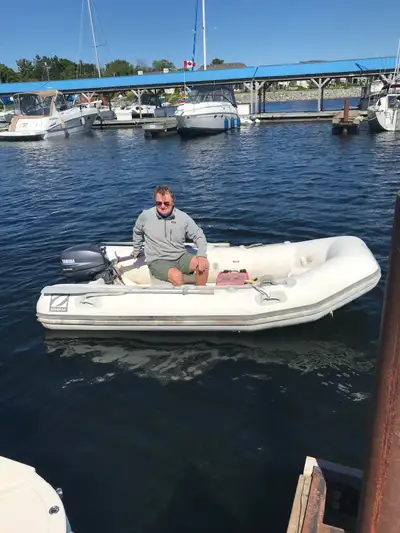 10 Zodiac c/w 9.9 Yamaha 2 stroke motor. Includes all safety equipment. At marina in storage . Can b...