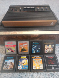 Atari 2600 with storage case and games