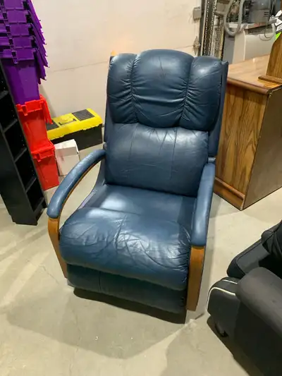 Sink into relaxation with this comfortable leather recliner, perfect for any living space. Showing s...