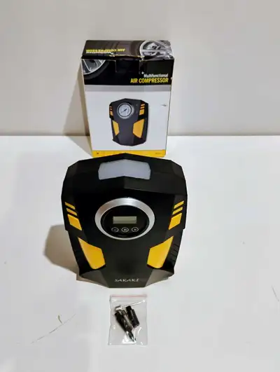 Compressor , 12 Volt. , 10 Amp. 15 Psi with accessories. $ 20.00.