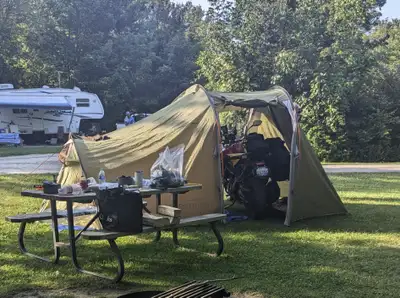 Cost, with sleeping bay ground cover new is $970. Asking $600 Great condition, used 4 times Comes wi...
