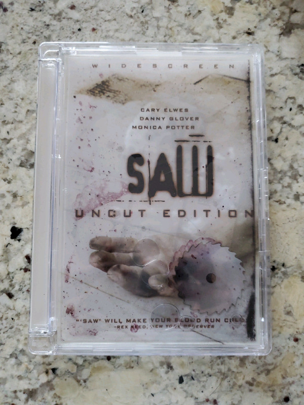 Saw Uncut Edition Widescreen DVD - Razor Case in CDs, DVDs & Blu-ray in Mississauga / Peel Region