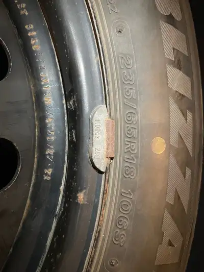 Rims are Nissan . Tires will fit any 18” steel rim . Tires are excellent condition. Blizzak are rate...