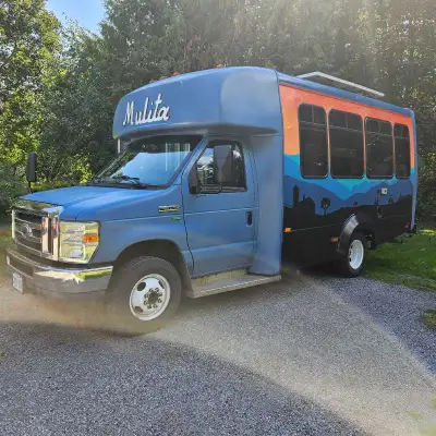 2010 Ford E 350 Super Duty Flex Fuel handicap bus 203,000 kms converted into cozy Rv. Professionally...