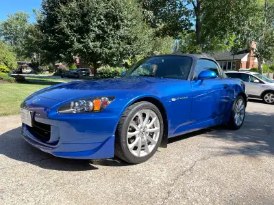 I'm selling my used 2007 Honda S2000. Slightly under 70,000km Convertible top has rips in it in the...