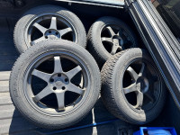 Winter tires on 18” rims 5x115 bolt pattern