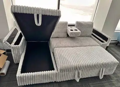 This brand new grey corduroy sectional sofa is the perfect addition to any living room, offering bot...