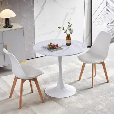 32" Table: $169+tax 36" Table: $189+tax 40" Table: $219+tax Matte White Marble MDF wood Slim tapered...