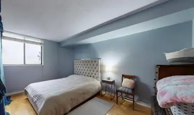 A Large Master bedroom for rent as a shared accommodation in a clean quiet condominium with access t...