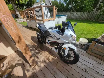 2011 Kawasaki Ninja 250R Special Edition Pearl White. Great beginner bike, cheap on insurance. After...