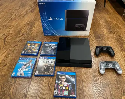 Playstation with 2 controllers, charging base, original box, cables and 5 games: Fifa 19 - still wra...
