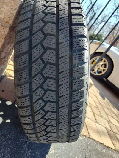 Set of 4 almost new winter tires on rim. 205/60R16