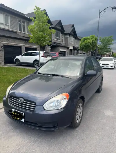 Selling a 2010 Hyundai Accent in good running condition with no mechanical issues. There is some rus...