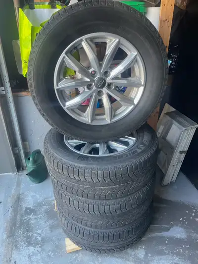 Set of 4 Michelin Latitude X-Ice winter tires mounted on genuine Audi 17” alloy rims. • Tire size: 2...