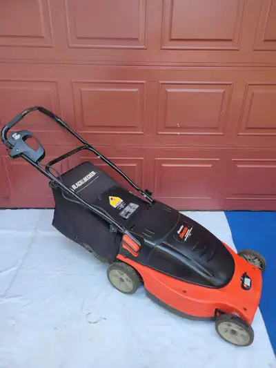 19" Black and Decker Electric LawnMower like new, View more